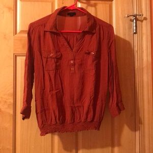 Orange button down shirt